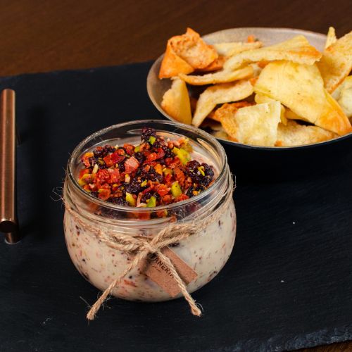 Queso cranberries y pistachos